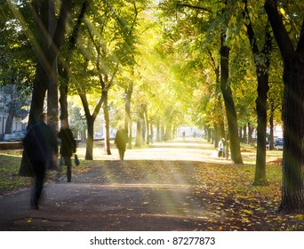 Autumn Morning City Alley And People Hurrying To Work