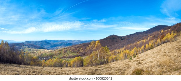 Autumn Mountain Country Landscape With Village ,birch Trees And Vapour Trail In Sky (Carpathian, Ukraine).