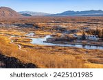 autumn in the mountains of Thingvellir National Park, Selfoss, Iceland; high angle view from the platform of Almannagjá Fissure Trail