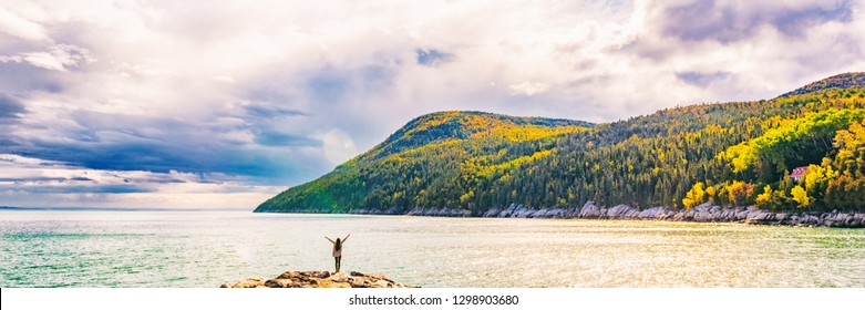 Autumn Nature Landscape Mountains Banner Background In Quebec, Canada. Fall Season St Lawrence River In Charlevoix Region, North America. Tourist Person With Arms Up Open In Freedom Happy Of Travel.