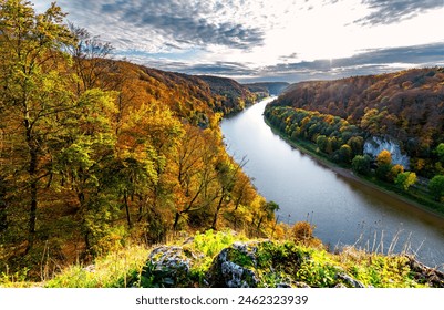 Autumn panorama with colorful foliage and Donau river near Kelheim, Bavaria (Germany). The famous “Weltenburger Enge“ narrows or Danube Gorge is a natural monument and reserve and tourist attraction. - Powered by Shutterstock