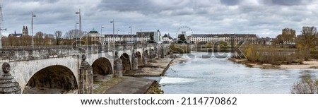 autumn panoramic view of the 18th century stone bridge Wilson bridge over the Loire river in Tours is one of the largest cities in the Centre-Val de Loire region of France