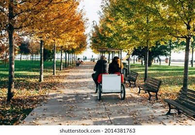 Autumn Park. Autumn Fun In The Park. Family Bike Ride In The Park. Autumn Activities.