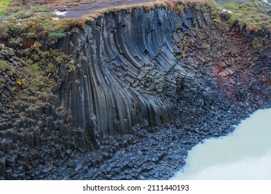 Autumn  picturesque Stuðlagil canyon is a ravine in Jökuldalur, Eastern Iceland. Famous columnar basalt rock formations and Jökla river runs through it. - Powered by Shutterstock