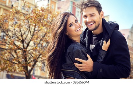 Autumn Portrait Of Attractive Happy Couple 