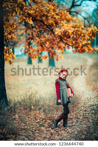 Similar – Foto Bild fröhlich lustiges Kind Mädchen isst frischen Apfel im Herbst