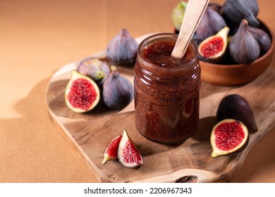 Autumn Preserves, Fig Jam Or Fig Marmalade On Wooden Board With Fresh, Ripe Figs, Top View