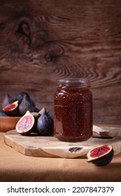 Autumn Preserves, Fig Jam Or Fig Marmalade On Wooden Board With Fresh, Ripe Figs, Still Life