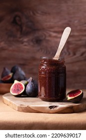 Autumn Preserves, Fig Jam Or Fig Marmalade On Wooden Board With Fresh, Ripe Figs, Still Life