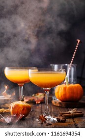 Autumn Pumpkin Cocktail On Wooden Table. 