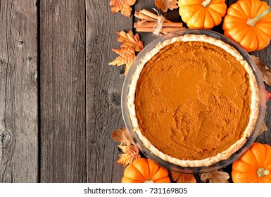 Autumn Pumpkin Pie, Overhead Table Scene On A Rustic Wood Background