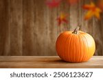 Autumn pumpkins still life on wooden table. Pumpkin on empty wooden table. Thanksgiving Still Life. Halloween pumpkin decoration border. Holiday festival concept