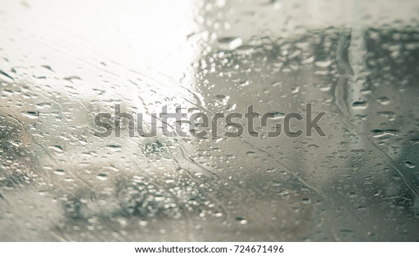 Autumn rain, sweaty glass.\
a drop of rain on the\
car window.