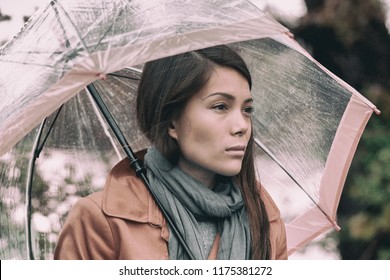 Autumn Rainy Grey Day Sad Girl Pensive. Asian Woman In Depression During Fall Season Mood Change.