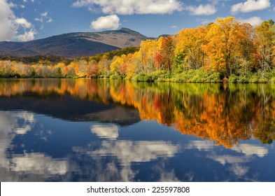 Autumn reflections on Price Lake along the Blue Ridge Parkway in North Carolina.