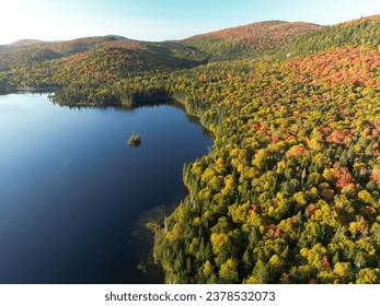 Autumn reflexion in Mont Tremblant National Park, Quebec, Canada, aerial view - Powered by Shutterstock