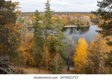 Autumn river scenery with colorful trees on riverbanks. Autumnal Siverskyi Donets River in Ukraine - Powered by Shutterstock