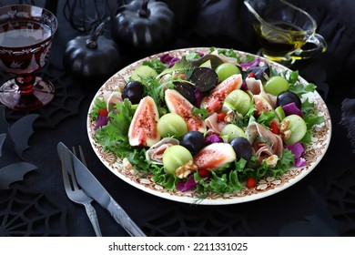 Autumn Salad With  Fig And Grape On Plate