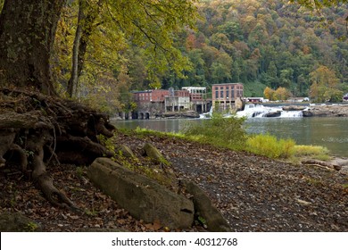 Autumn scene of waterfall and dam on Kanawha River in Glen Ferris, West Virginia