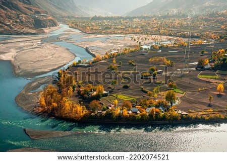 Autumn season at ayun valley along with a bank of kunar river symbol of fall leaves 