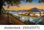 Autumn season at a historic city of Salzburg with Salzach river in beautiful sunset sky and colorful of autumn scene Salzburger Land, Austria