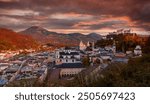 Autumn season at a historic city of Salzburg with Salzach river in beautiful sunlight sky and colorful of autumn scene Salzburger Land, Austria