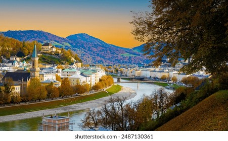 Autumn season at a historic city of Salzburg with Salzach river in beautiful sunset sky and colorful of autumn scene Salzburger Land, Austria - Powered by Shutterstock