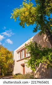 Autumn Southwestern Landscape And Vibrant Foliage With Partial View Of Adobe House In Albuquerque, New Mexico, USA