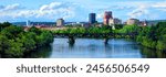 Autumn Splendor: Stunning 4K image of Manchester, New Hampshire Skyline Along the Merrimack River