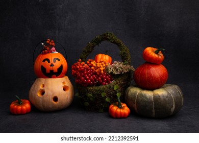 Autumn Still Life With Pumpkins, A Basket Of Berries On A Black Textured Background, Halloween, Do-it-yourself Festival Holiday Decor, All Saints Day, Harvest, Space For Text, Postcard, Theme Party