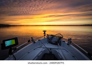 Autumn sunrise over the boat - Powered by Shutterstock