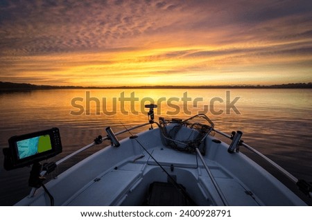 Autumn sunrise over the boat