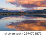 Autumn Sunset at Dillon Reservoir - A colorful sunset view of Dillon Reservoir on a calm Autumn evening. Dillon, Summit County, Colorado, USA. 