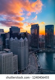 Autumn Sunset Over The Chicago River In The Downtown Loop During Evening Rush Hour.