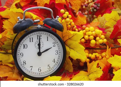 Autumn Time Change, Autumn Leaves And Alarm Clock