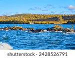 Autumn Tranquility at Eagle Harbor: Forest, Rocks, and Lake Superior