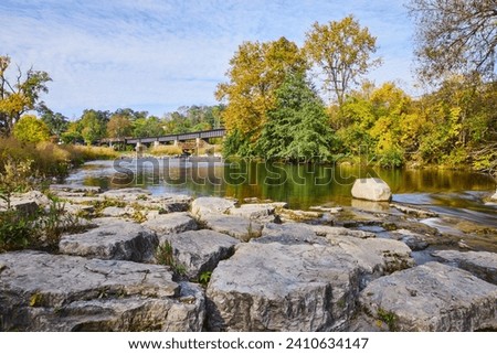 Autumn Tranquility at Huron River with Rustic Bridge