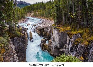  Autumn Trip To Canada, Jasper National Park. The Picturesque Waterfall Sanvapta Falls. The Concept Of Extreme And Ecological Tourism