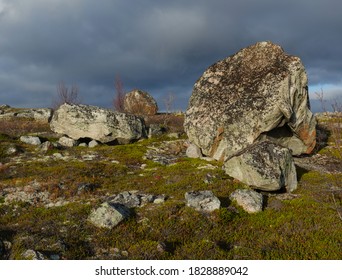 Autumn Tundra . Huge Stone . Storm Clouds And Moss.