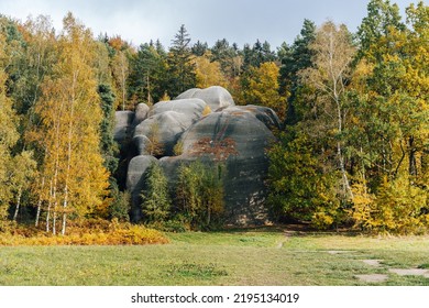 Autumn view of Elephant rocks near Liberec, Czechia. Autumn landscape with huge sandstone rocks. High rocks in autumn forest.