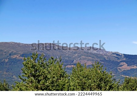 Autumn view of the highest peaks and old buildings of Vitosha mountain near Sofia, Bulgaria 