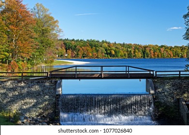 Autumn Waterfall At Bridge Over Promise Land Lake In Northeastern Pennsylvania