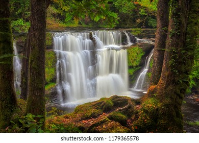 Autumn At The Waterfall Known As Sgwd Y Pannwr In Waterfall Country, South Wales, UK
