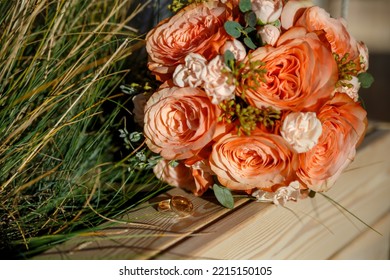 Autumn Wedding Bouquet Of Roses And Two Golden Rings. Autumn Postcard