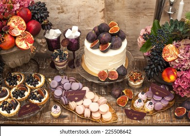 Autumn wedding sweet bar. Cake, cupcakes, sweetness and flowers.