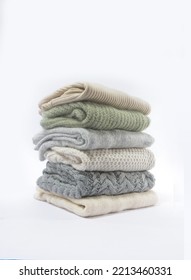 Autumn winter season
 ,Stack of cozy knitted warm sweater., 
 - Shutterstock ID 2213460331