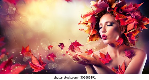 Autumn Woman Blowing Red Leaves - Beauty Fashion Model Girl
