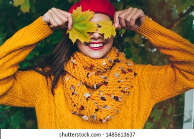 Autumn Woman In Autumn Park. Warm Sunny Weather. Fall Concept.Pretty Girl In A Beret And A Sweater In Autumn Park