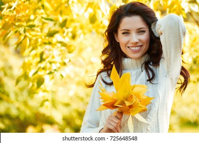 Autumn Woman In Autumn Park. Warm Sunny Weather. Fall Concept