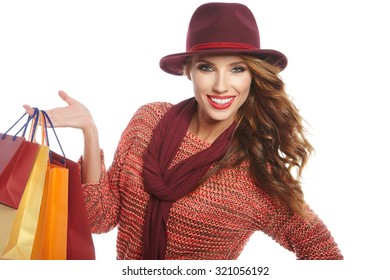 Autumn Woman With Shopping Bags. Studio Shoot